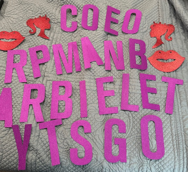Red and purple glitter letters and decals