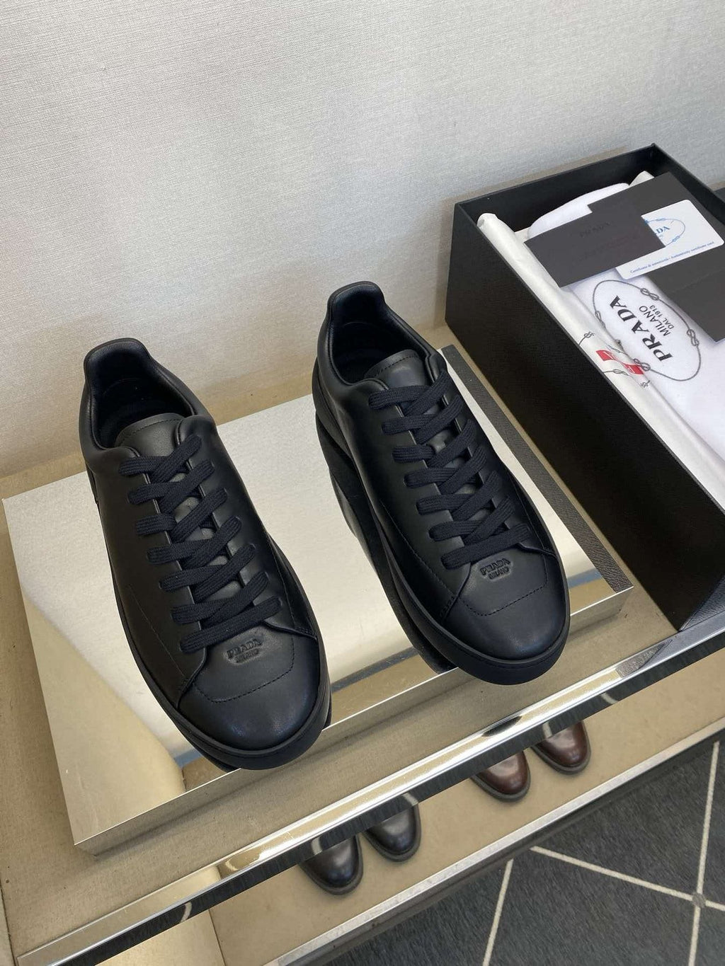 Prada Black Lace-Up Low-Top Sneakers — front