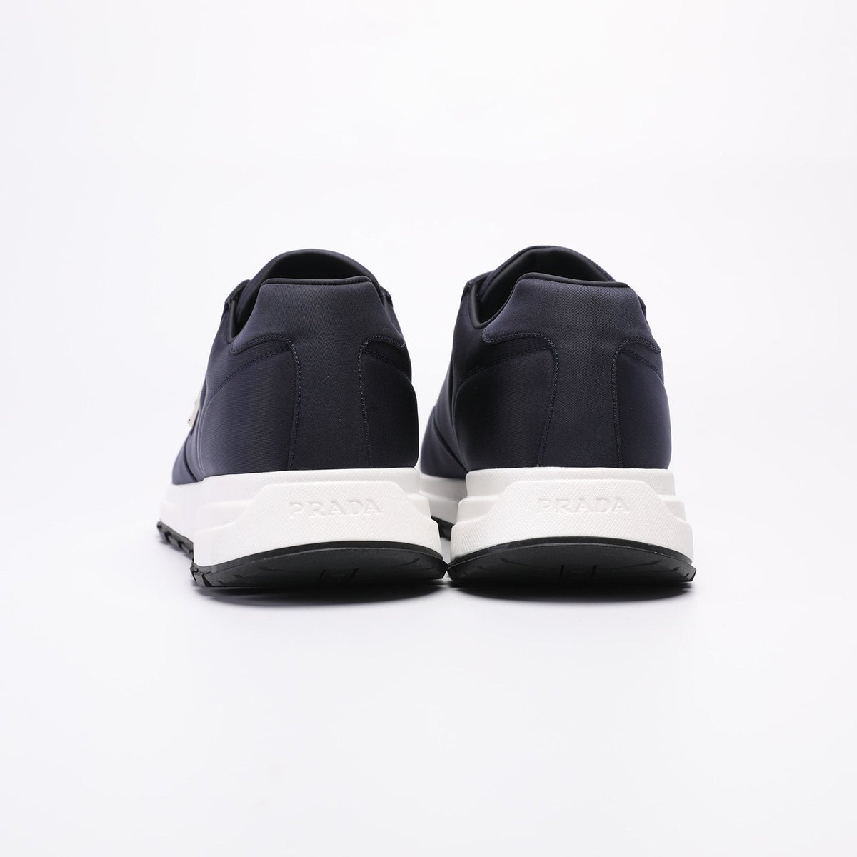 PRADA Navy Triangle Badge Sneakers — back
