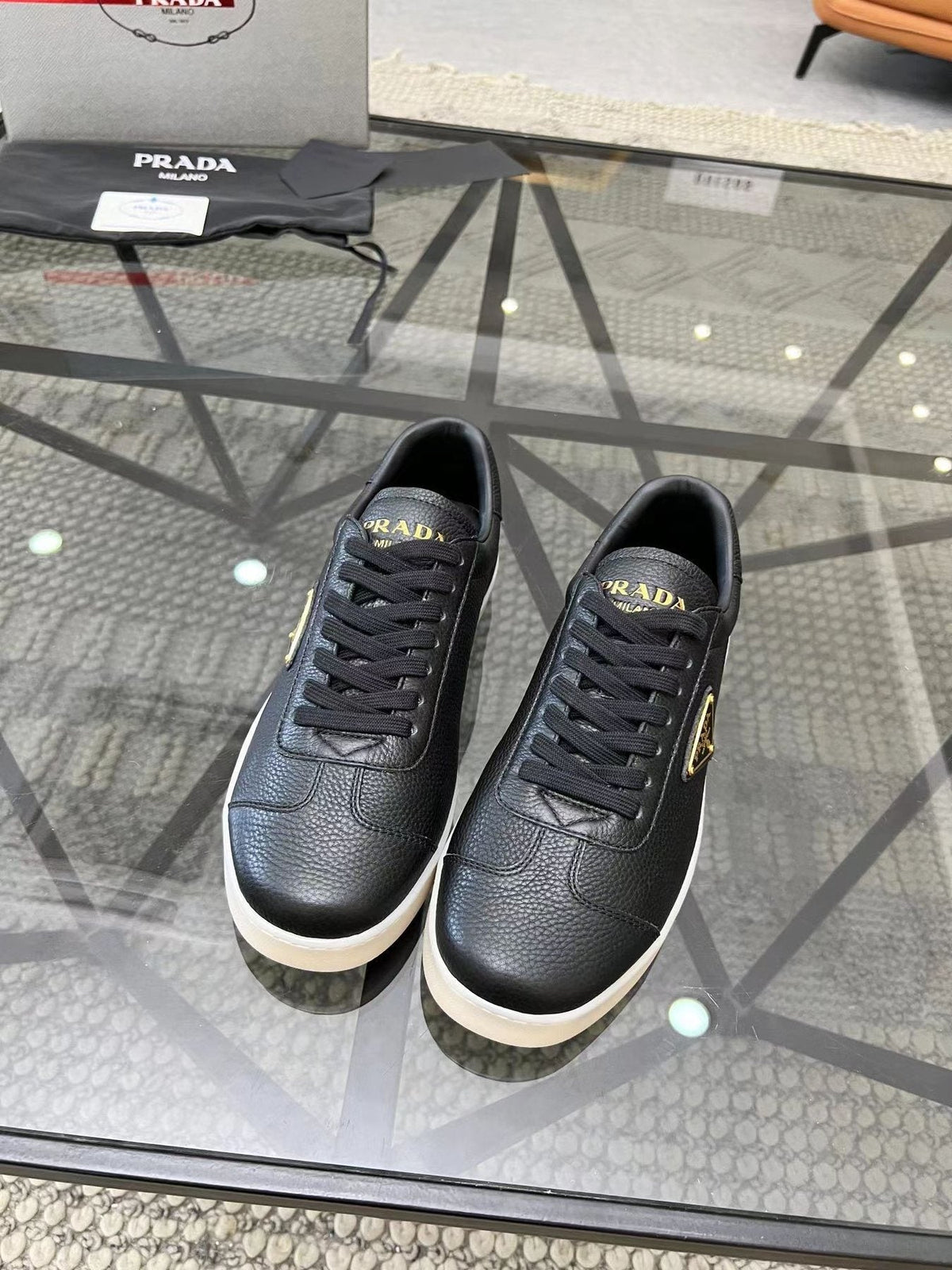 Prada Gold Accent Low-Top Sneakers — front
